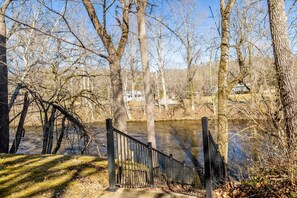 Property grounds - Step from the patio into the Little River. Walking distance to AWESOME! (Townsend)