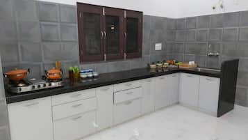 Fridge, microwave, electric kettle, cookware/dishes/utensils