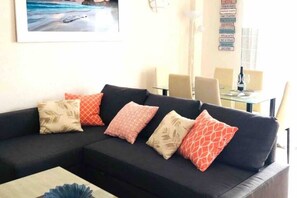 Standard Apartment, Pool Access, Beachside | Living area | 40-inch Smart TV with digital channels, Netflix, DVD player