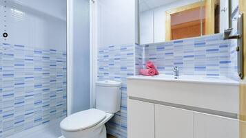 Standard Apartment, Pool Access, Beachside | Bathroom | Shower, hair dryer, towels, soap