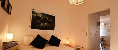 1 bedroom, desk, iron/ironing board, travel crib