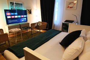 1 bedroom, desk, iron/ironing board, travel crib