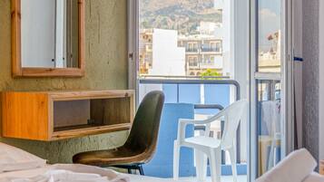 Twin Room | Desk, blackout drapes, free cribs/infant beds, free WiFi