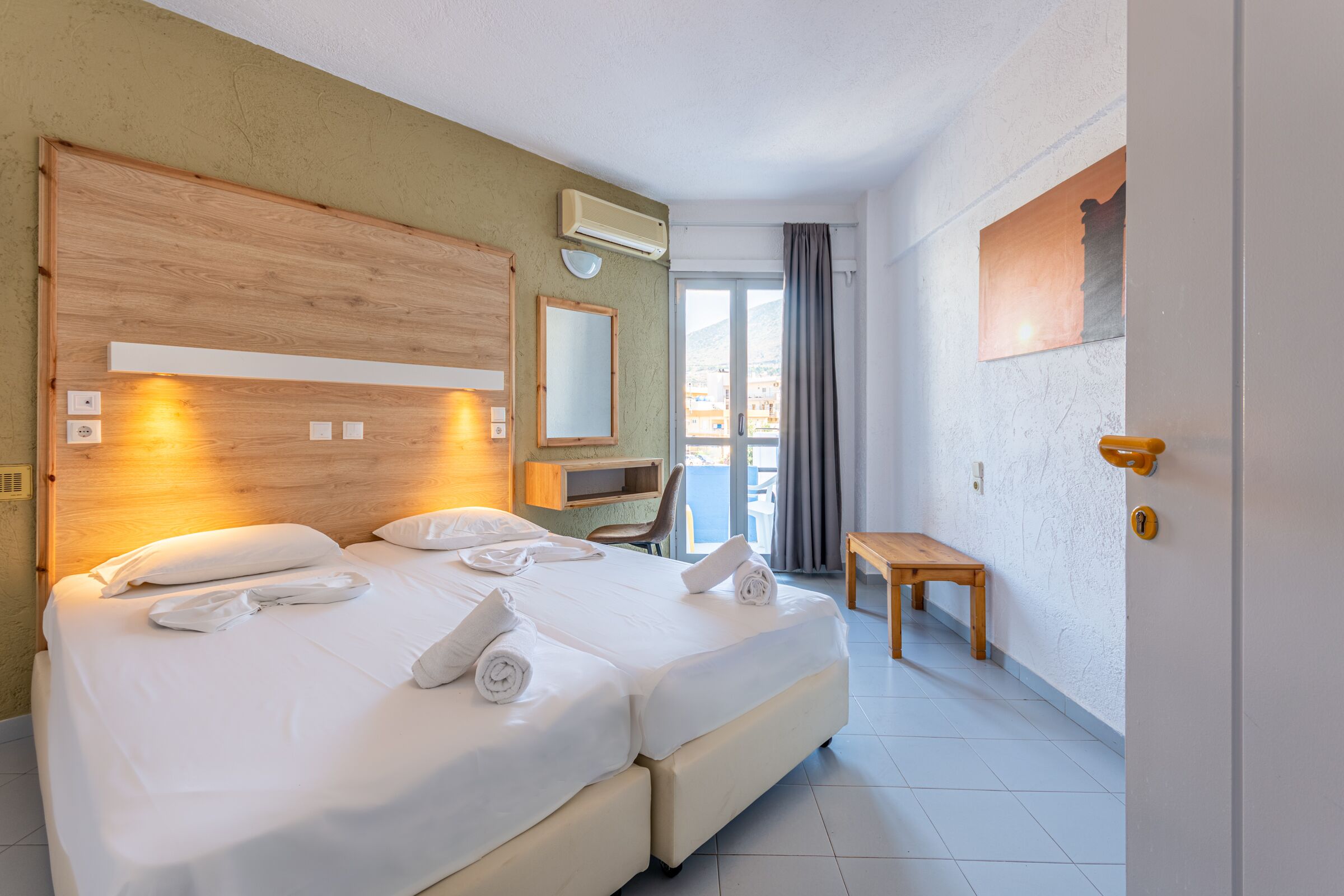 Desk, blackout curtains, free cots/infant beds, free WiFi