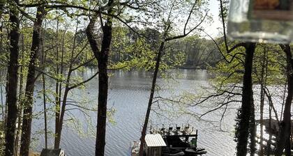 Waterfront Lake Gaston Retreat with beautiful views, Gameroom and covered deck.