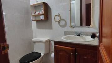 Basic Suite, 1 Bedroom | Bathroom | Shower, towels, soap, toilet paper