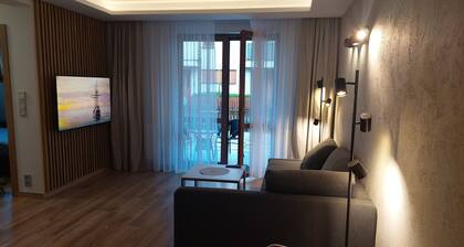 Brand new, luxury apartment with private patio.
Closed, guarded, intimate estate