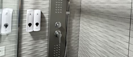 Shower, towels, soap, shampoo
