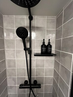 Shower, hair dryer, towels, soap