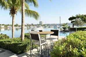 Outdoor dining - Coastal Gem in gated community. Waterfront, pool, 20 mins from airport  (Montego Bay)
