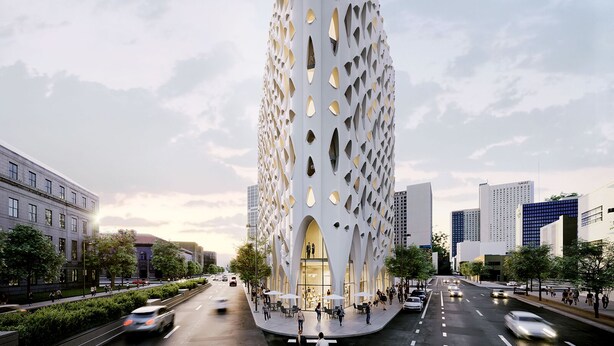 A modern building with a unique perforated facade, surrounded by a busy urban street with cars and pedestrians. - Chic Apt w/parking - Walk to Capitol, Convention Center, museums & shops! (Denver)
