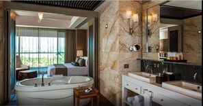 Jetted tub, hair dryer, towels, soap