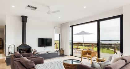 Luxe off-grid beach house with panoramic views of Middle River & Snelling Beach