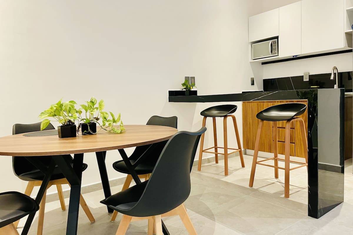 Apartamento conforto | Área de estar | TV de tela plana
