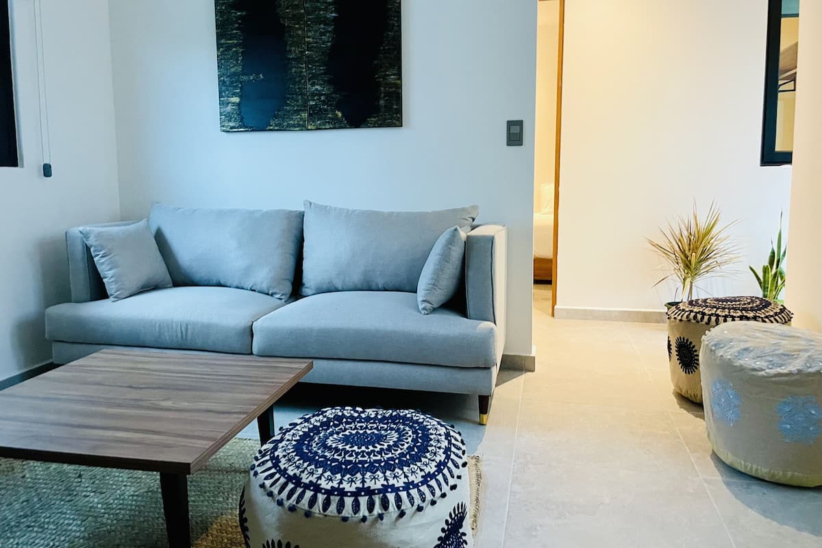 Apartamento conforto | Área de estar | TV de tela plana