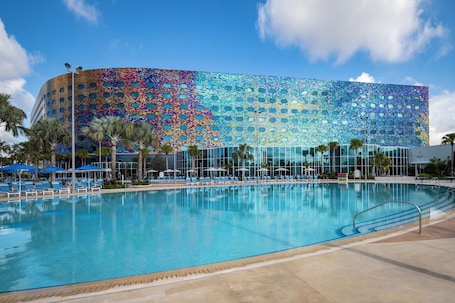 Outdoor pool, open 9:00 AM to 10:00 PM, pool umbrellas, sun loungers
