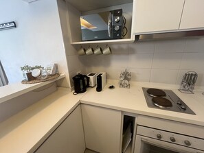 Fridge, oven, electric kettle, toaster
