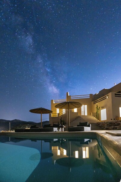 A private sanctuary above the Aegean
.
Sunlight, stillness, and the olive grove