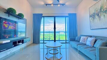 Comfort Apartment, Multiple Beds, Sea View | Living area | 42-inch Smart TV with cable channels, Netflix, streaming services