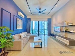 Design Apartment | Living area | 42-inch Smart TV with cable channels, Netflix, streaming services - Atlantis Residences Melaka by Stayrene (Malacca City)