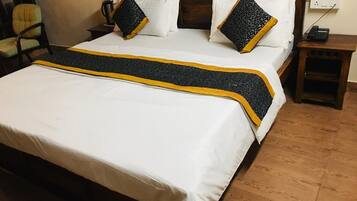 Habitación Deluxe | Ropa de cama de alta calidad y decoración personalizada