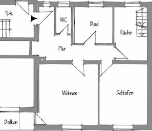 Plano de planta con habitaciones identificadas: WC, baño, cocina, mujeres, dormitorio, balcón y teléfono.