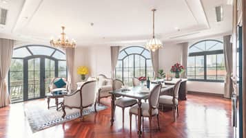 Royal Apartment | Living area | 60-inch Smart TV with digital channels