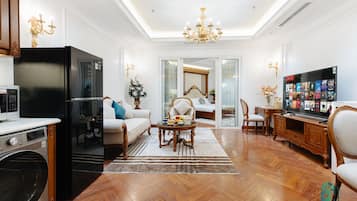 Apartamento standard | Área de estar | Smart TV 60 polegadas com canais digitais