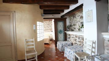 Suite Deluxe | Coin séjour | Télévision à écran plat