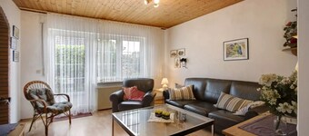 Bungalow in Neßmersiel invites you to a relaxing vacation with its terrace and other amenities.