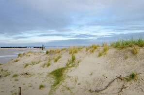 Beach - Ground floor apartment with terrace for 3 pers. max. 4 pers. Pets allowed Wallbox (Nessmersiel)