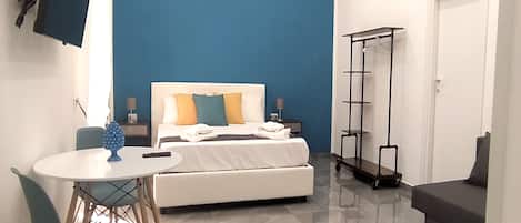 Classic Quadruple Room | 1 bedroom, in-room safe, desk, laptop workspace