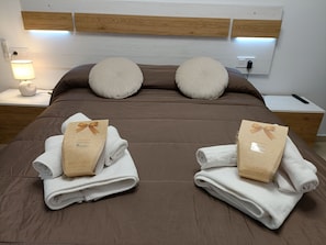 1 bedroom, desk, iron/ironing board, travel cot