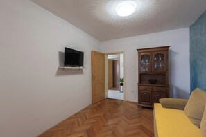 21-inch flat-screen TV with cable channels, TV - Family Resort Santa Maria I Apartment 1 (Novalja)