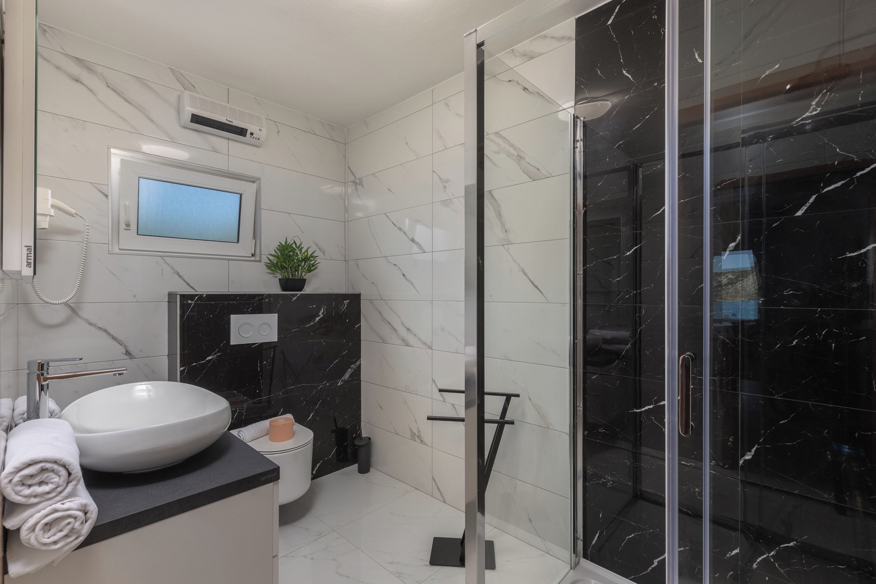 Shower, hair dryer, towels, soap