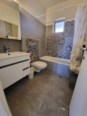 Shower, towels, soap, shampoo