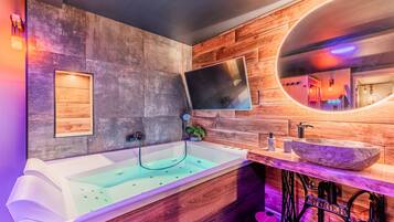 Jetted bath, hair dryer, towels, soap