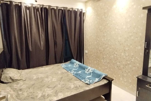 bedroom with attached washroom and balcony