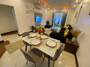 Deluxe Apartment | Living area | Fireplace
