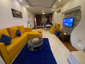 Executive Apartment | Living area | Fireplace