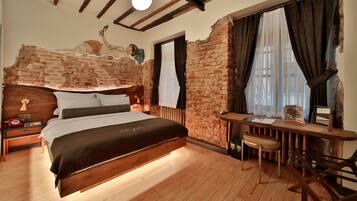 Suite | Down comforters, minibar, in-room safe, individually decorated