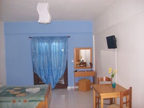 Appartement, vue jardin | 1 chambre, fer et planche à repasser, Wi-Fi gratuit