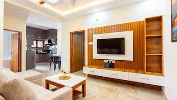 Executive-Apartment | Wohnbereich | Flachbildfernseher