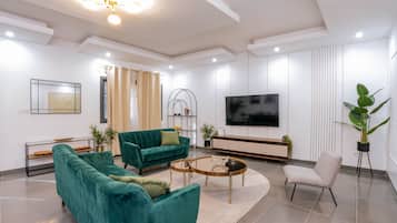 Exclusive Apartment | Living area | 32-inch Smart TV with digital channels