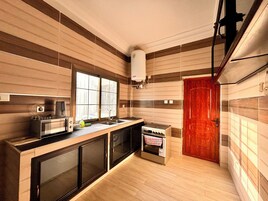 Apartamento Signature | Cocina privada