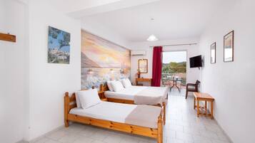 Tabla de planchar con plancha, wifi gratis y ropa de cama