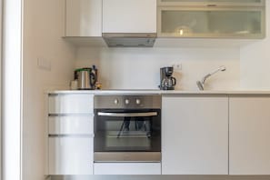 Apartment | Private kitchen | Full-sized fridge, microwave, oven, stovetop - Sea Sound Apartment by Trip2Portugal (Sesimbra)