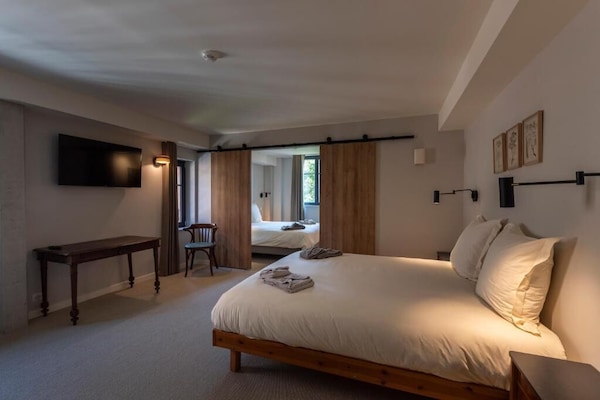 Quadruple Room | In-room safe, individually decorated, desk, laptop workspace