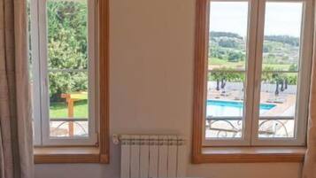 Habitación Deluxe con 1 cama matrimonial o 2 individuales | Insonorización, wifi gratis y ropa de cama