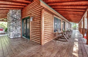 Terrace/patio - Unique log cedar family vacation home with 185 feet of secluded lake frontage (Hale)
